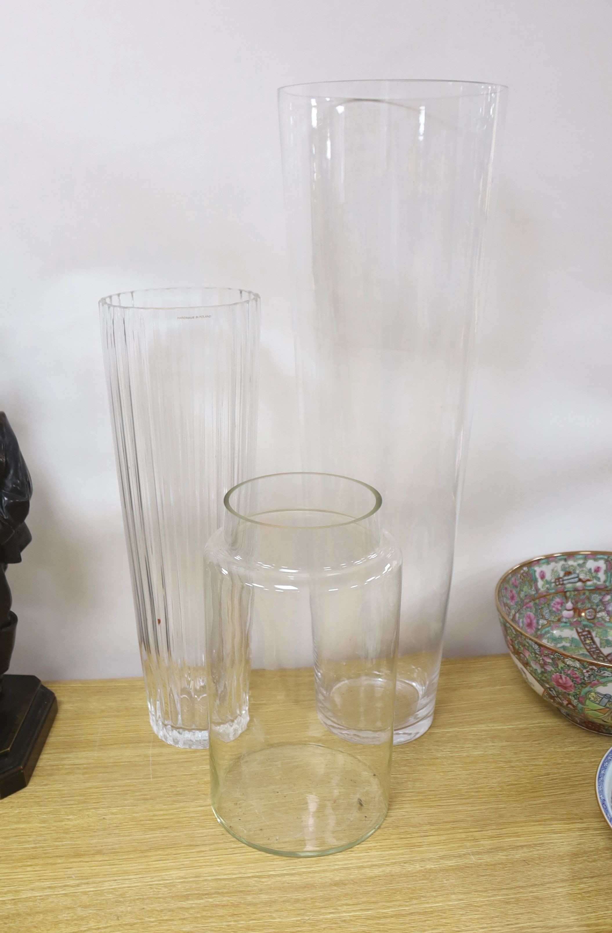 Two large flower arranging glass vases and a glass jar 70cm
